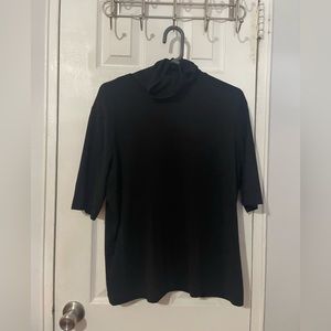 Mango turtleneck short-sleeve shirt.